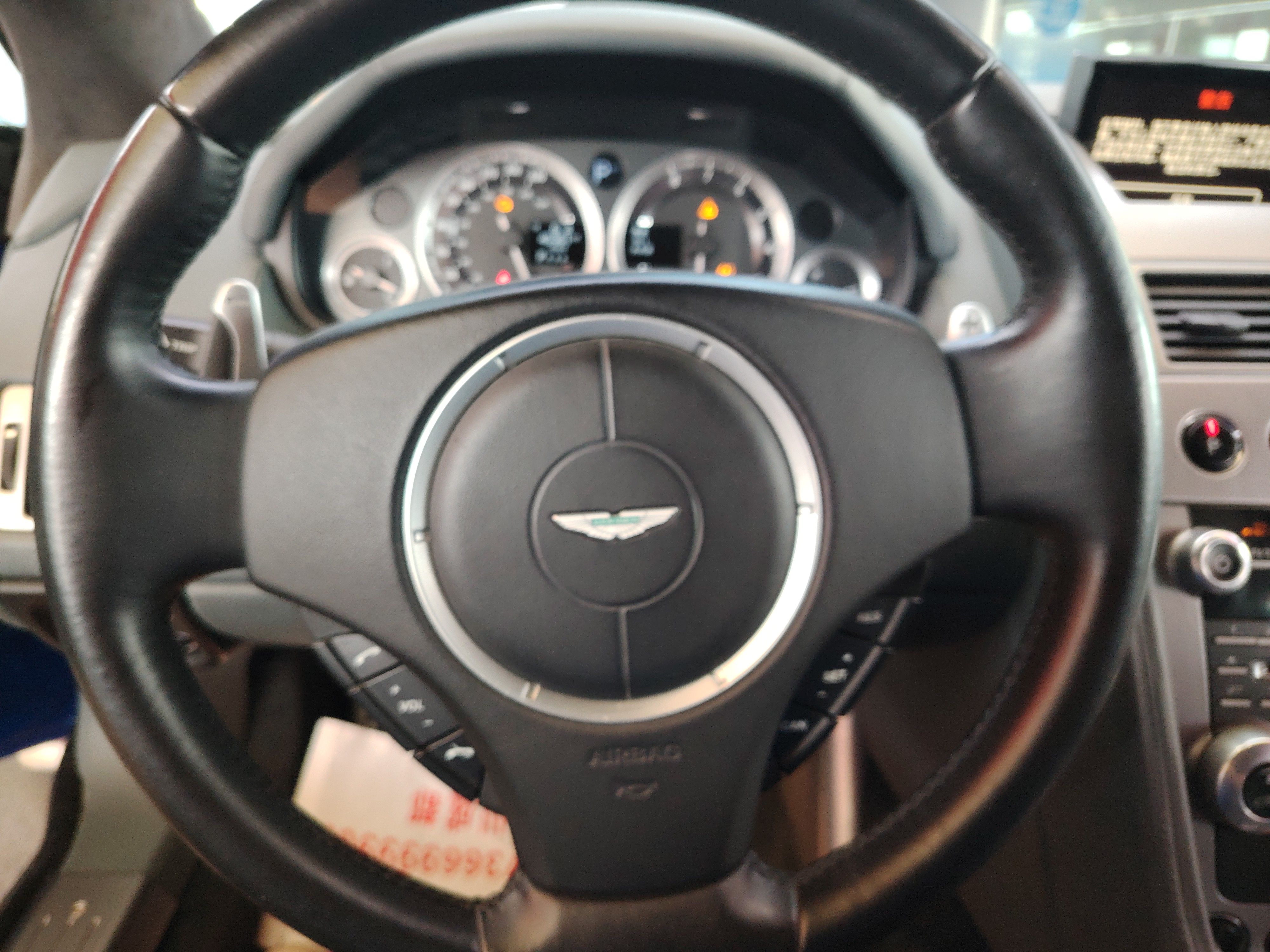 Aston Martin DB9 2010 — фото 15